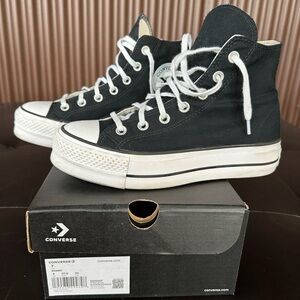 Converse Black and White High-Top Athletic Shoes